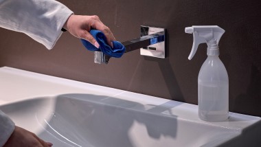 Drying your tap with a soft cloth